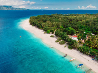 Tropical island with luxury beach and turquoise sea. Aerial view.