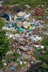 Novi Sad, Serbia - May 23, 2020: Landfill in the city center. People throw old things and garbage everywhere