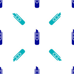 Blue Stationery knife icon isolated seamless pattern on white background. Office paper cutter. Vector