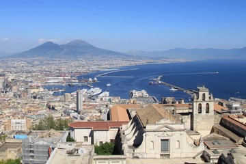 Fototapeta na wymiar Naples, Italy - Stunning view of the Certosa di San Martino monastery complex, the city of Napoli and Mount Vesuvius. From the Castle Sant'Elmo on the Vomero hill.