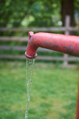 running water from a homemade old pump
