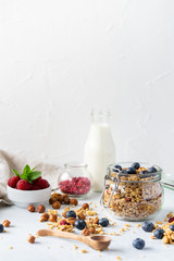 Healthy breakfast set on grey background. The concept of delicious and healthy food. Top view, copy space. 