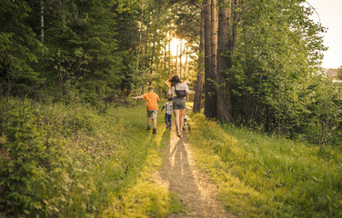 mother with children walking 