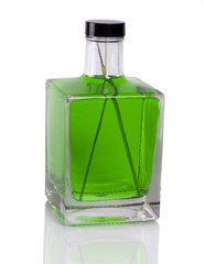 glass bottle of alcohol on a white background