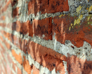 Weathered stained old brick wall beautiful background.