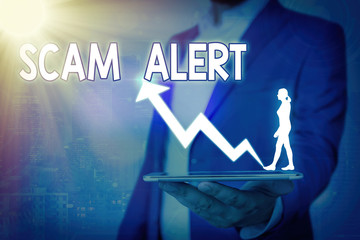 Handwriting text Scam Alert. Conceptual photo unsolicited email that claims the prospect of a...