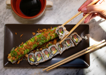 taking sushi with sticks 2