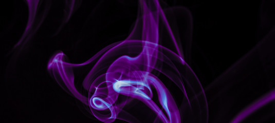 Purple smoke on black background