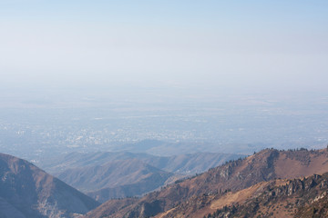 Fototapeta na wymiar Clear blue sky mountains landscape drone view