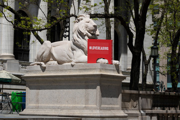 New York, NY / USA - April 27, 2020: The New York Public Library's Main Branch and its iconic stone lions look over a Fifth Avenue