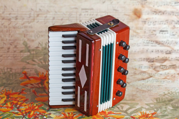 Classical musical instrument, miniature toy bayan (accordion)  with keyboard and buttons