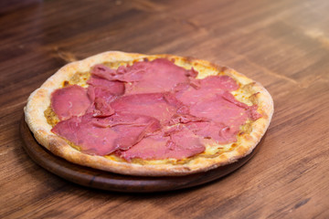 bresaola pizza with porcini mushroom sauce