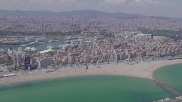 Through the eyes of a Bird, an Helicopter Aerial Shot of Barcelona, Spain HD Daylight