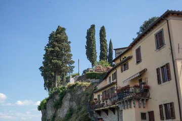 Fototapeta na wymiar View of balconies full of flowers in Barga, Tuscany, Italy.
