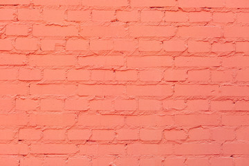 coral color brick wall texture background