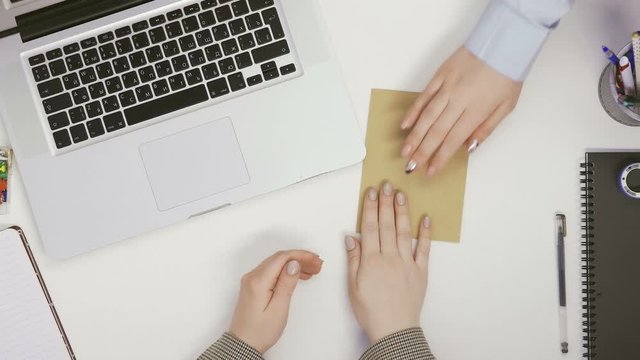 Corruption. Businessman gives a bribe, but another Businessman doesn't take