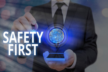 Word writing text Safety First. Business photo showcasing used to say that the most important thing...