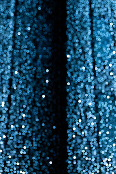 Blurry background of blue lights © Sergi