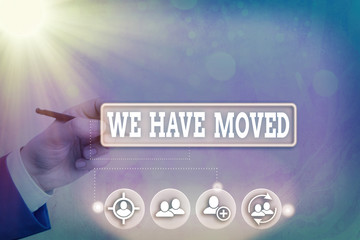Conceptual hand writing showing We Have Moved. Concept meaning To go from one residence or location...