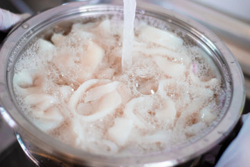 Cleaning Squid Rings for cooking