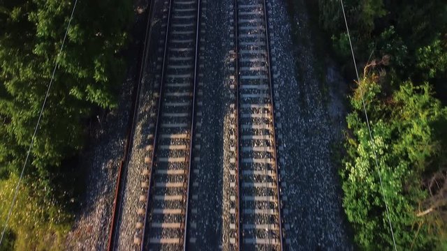 Flying over railway tracks, top view .
