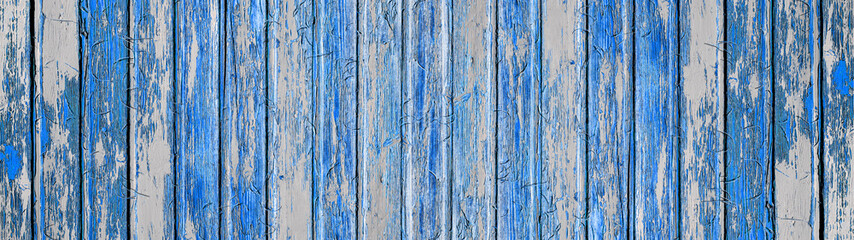 Fototapeta na wymiar Blue white painted exfoliated peeled wooden boards texture background background banner