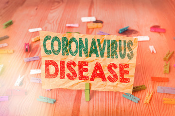 Conceptual hand writing showing Coronavirus Disease. Concept meaning defined as illness caused by a...
