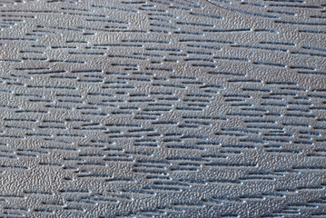 grey and blue rough leather surface