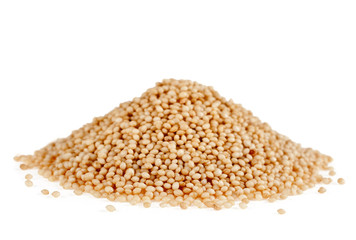 Heap of amaranth seeds isolated on a white background.