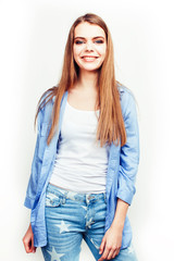 young pretty teenage hipster girl posing emotional happy smiling on white background, lifestyle people concept