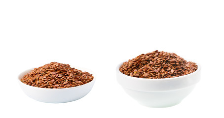 flaxseed in a  ceramic bowl  isolated on a white background.