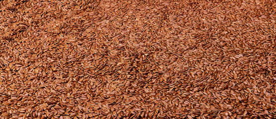 natural flaxseed for background, close up shot. flax seeds as texture background