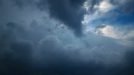 Naklejka na ściany i meble Storm clouds overtook the blue sky before the rain
