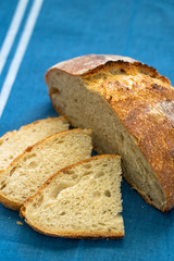 Sliced boule (round loaf) of freshly baked sourdough bread
