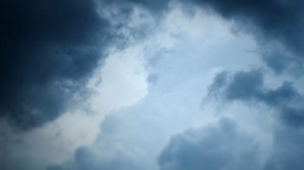 Storm clouds overtook the blue sky before the rain