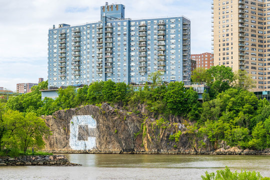 Blue Residential Building Near The Henry Hudson Parkway And Inwood Hill Park.