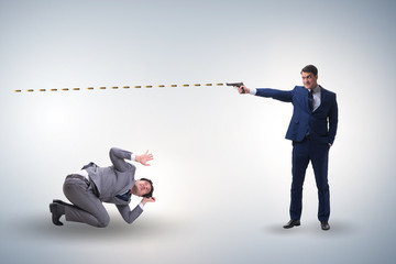 Businessman with gun threatening his competitor
