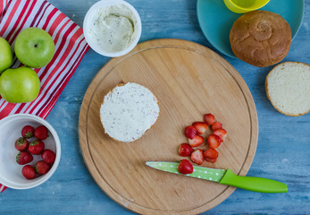 Children's fun food.Sandwich in the form of a flower out of strawberries for kids breakfast.Step-by-step recipe for cooking dishes for menu. Festive and new year dishes.Instructions. DIY. Step 4