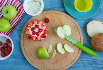 Children's fun food.Sandwich in the form of a flower out of strawberries for kids breakfast.Step-by-step recipe for cooking dishes for menu. Festive and new year dishes.Instructions. DIY. Step 6