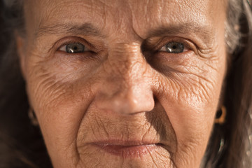Senior woman with blue eye's looking at the camera