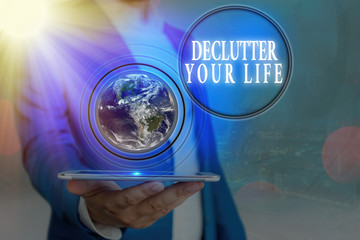 Handwriting text Declutter Your Life. Conceptual photo To eliminate extraneous things or information in life Elements of this image furnished by NASA