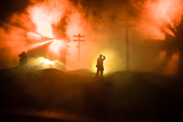 Obraz na płótnie Canvas War Concept. Military silhouettes fighting scene on war fog sky background, World War Soldiers Silhouette Below Cloudy Skyline At night.