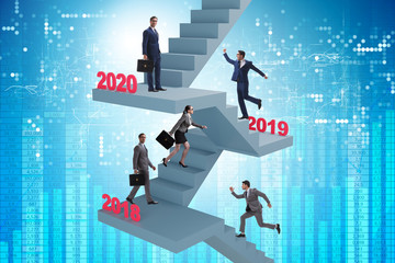 Businessman climbing stairs on yearly basis