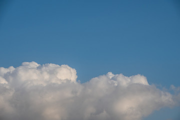 Sunny cloudscape blue sky with white cumulus clouds cloudscape. Beautiful nature background backdrop sky.