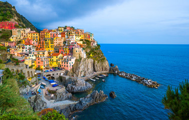 Panoramic view of Manarola town in Cinque Terre and the mediterranean sea, in Italy.