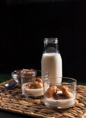 eggs of milk, typical dessert of Extremadura, fried dough with milk, cinnamon and cocoa sprinkled