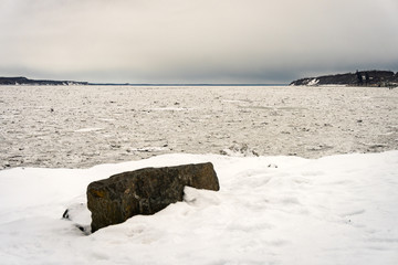 Winter landscape with ice floes on the waters of Knik Arm in the north of Anchorage, Alaska. Taken...