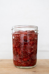 homemade strawberry jam in a glass jar