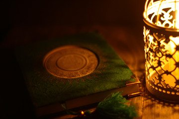 Close up shot of candle lantern on a rustic wooden table