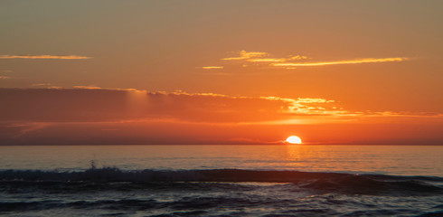 Obraz premium sunset over the sea, ocean, sky, sun, water, beach, clouds, orange, evening, yellow, Siesta Key, Florida